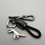 Cute cartoon dinosaur car keychain with braided rope - Image 3
