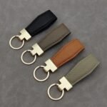 Leather car keychain, fashionable genuine leather key chain, alloy pendant - Image 5