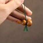 Peach wood gourd mobile phone pendant, antique style handmade woven car key chain - Image 3