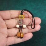 Handicrafts: woven yak bone carved keychains and mobile phone charms - Image 4