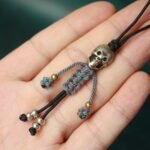 Handicrafts: woven yak bone carved keychains and mobile phone charms - Image 5