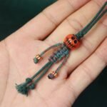 Handicrafts: woven yak bone carved keychains and mobile phone charms - Image 6