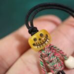 Handicrafts: woven yak bone carved keychains and mobile phone charms - Image 8