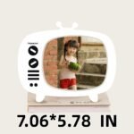 A custom-made, integrated photo frame, resembling a retro television set, is used to record a child's growth journey - Image 2